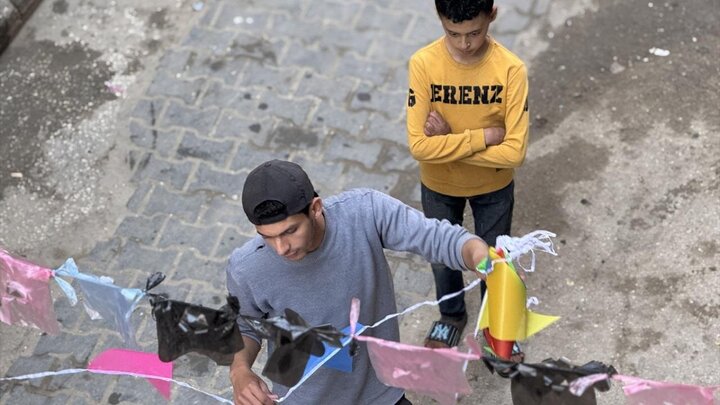Photos: Cleaning, decorating streets to welcome Ramadan in Khan Yunis