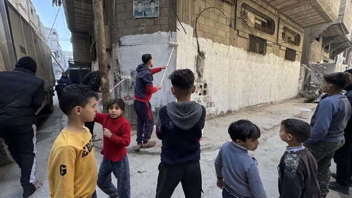 Photos: Cleaning, decorating streets to welcome Ramadan in Khan Yunis