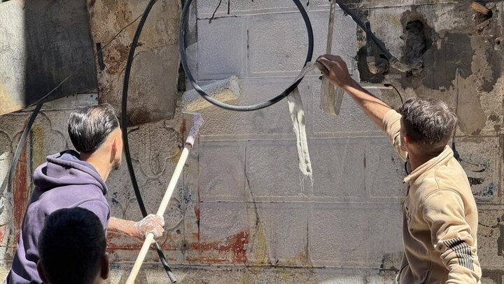 Photos: Cleaning, decorating streets to welcome Ramadan in Khan Yunis