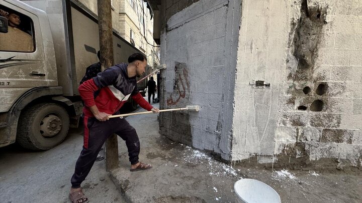 Photos: Cleaning, decorating streets to welcome Ramadan in Khan Yunis