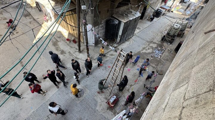 Photos: Cleaning, decorating streets to welcome Ramadan in Khan Yunis