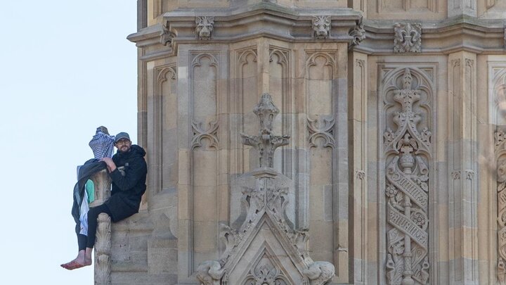 Photos: Young man with Palestinian flag climbs Big Ben clock tower in London
