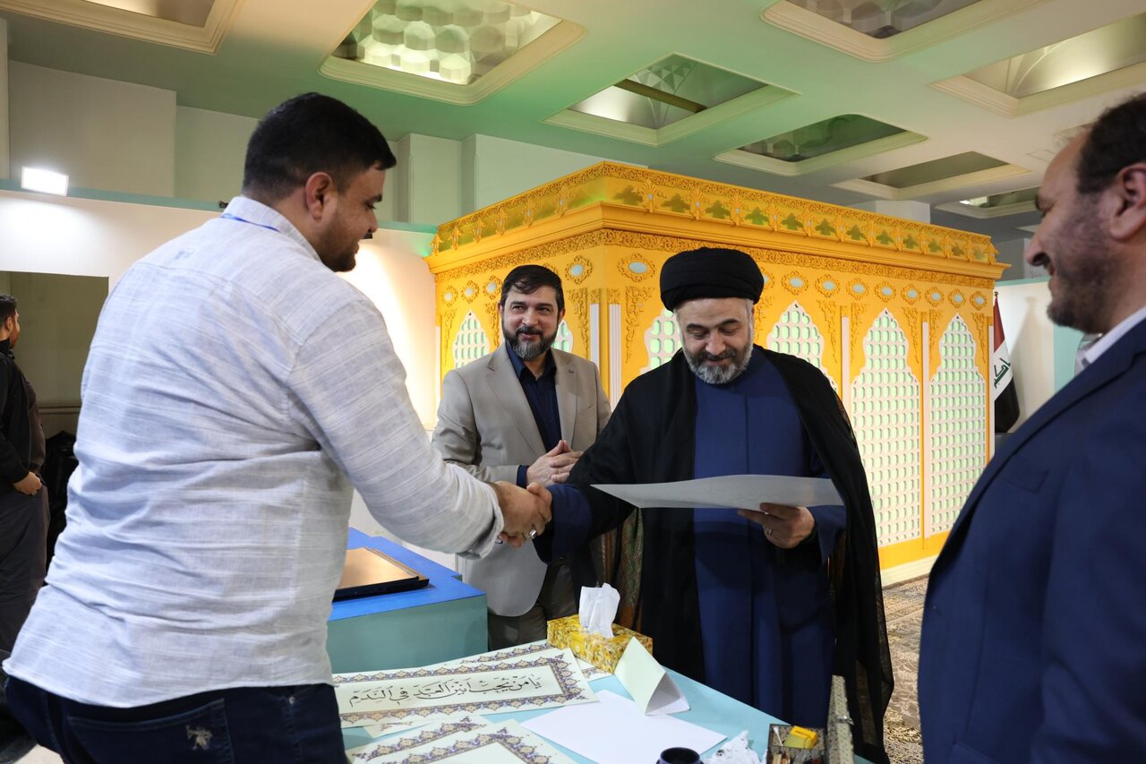 Director of Tehran Holy Quran exhibition praises pavilion of Al-Abbas holy shrine (+Photos)