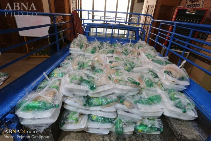 Photos: Preparing, distributing iftar meals, food packages to needy people in Isfahan