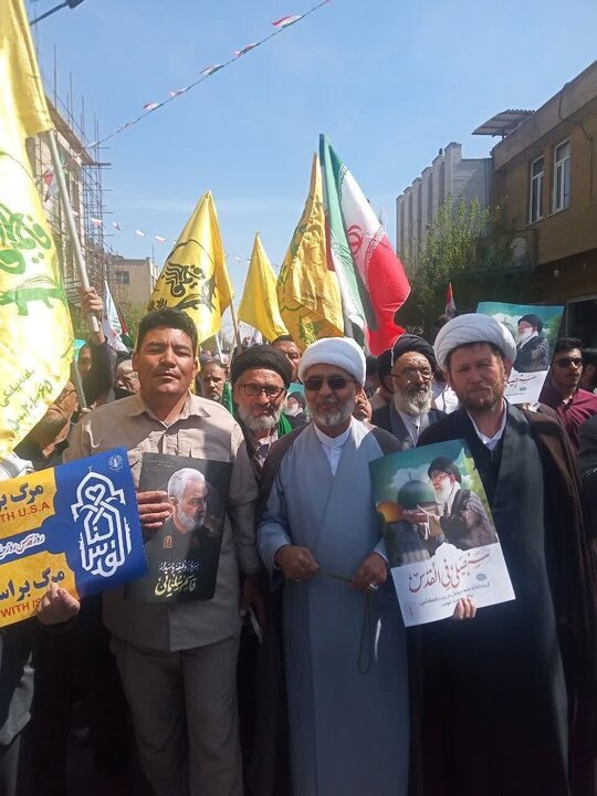 Photos: Fatemiyoun fighters, Afghan immigrants participate in Quds Day march