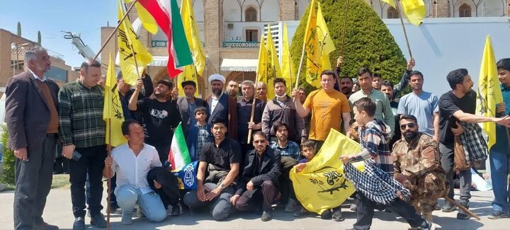 Photos: Fatemiyoun fighters, Afghan immigrants participate in Quds Day march