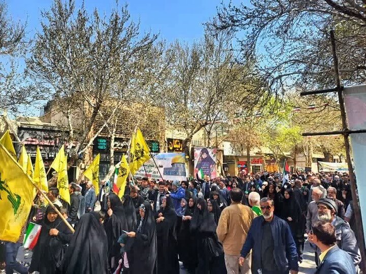 Photos: Fatemiyoun fighters, Afghan immigrants participate in Quds Day march