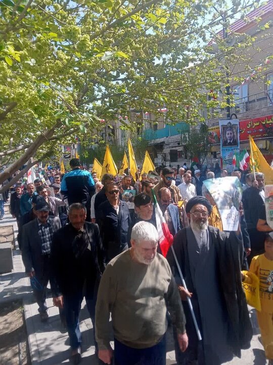 Photos: Fatemiyoun fighters, Afghan immigrants participate in Quds Day march