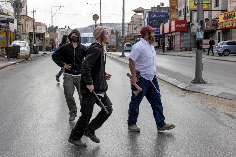 Extremist Jewish settlers attack Palestinian villages under military protection