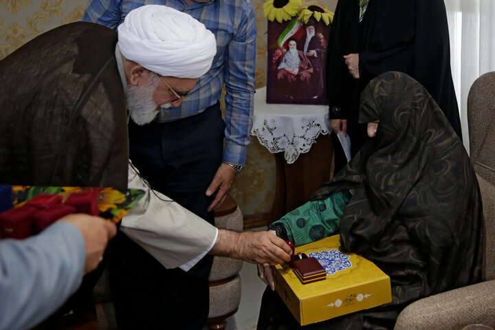 Photos: Custodian of Astan Quds Razavi meets with martyrs families