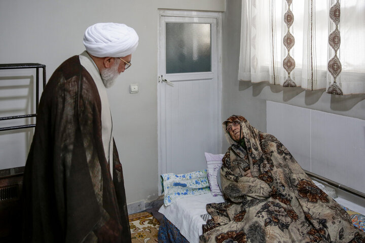 Photos: Custodian of Astan Quds Razavi meets with martyrs families