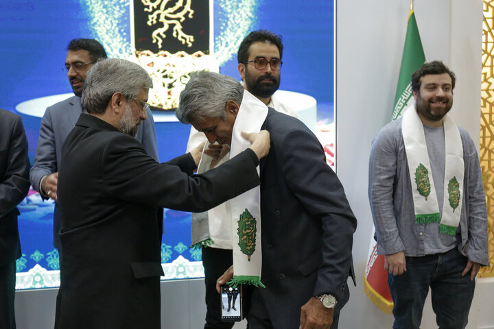Photos: Crystal Simorgh for Best Film at Fajr Festival donated to Astan Quds Razavi