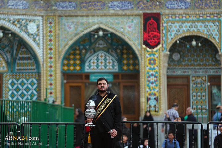 آیین تعویض پرچم گنبد حرم حضرت فاطمه معصومه(س) به مناسبت ماه محرم