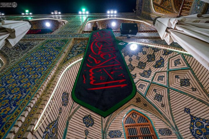 Photos: Imam Ali holy shrine covered in black on eve of Muharram