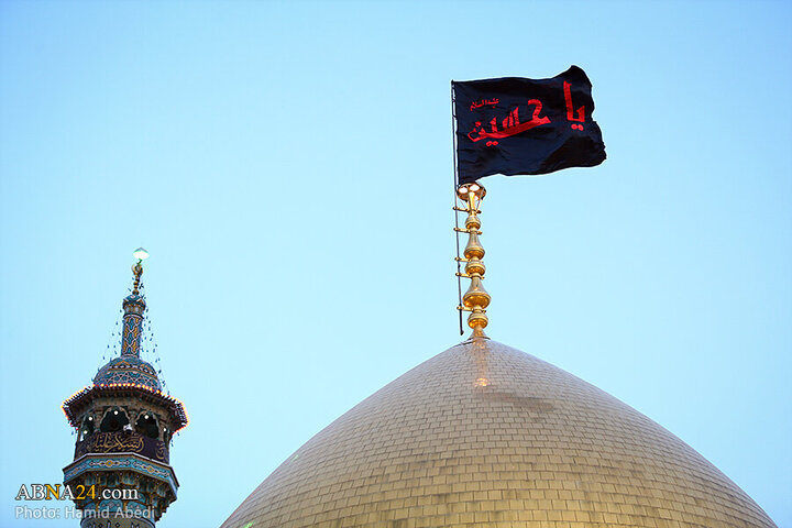 Photos: Changing flag of Hazrat Masoumeh shrine's dome ahead of Muharram