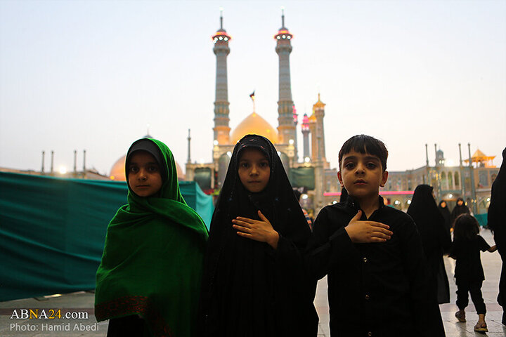 Photos: Changing flag of Hazrat Masoumeh shrine's dome ahead of Muharram