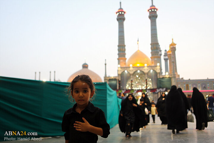 Photos: Changing flag of Hazrat Masoumeh shrine's dome ahead of Muharram