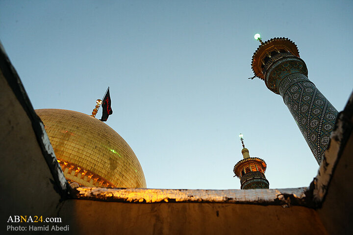 Photos: Changing flag of Hazrat Masoumeh shrine's dome ahead of Muharram