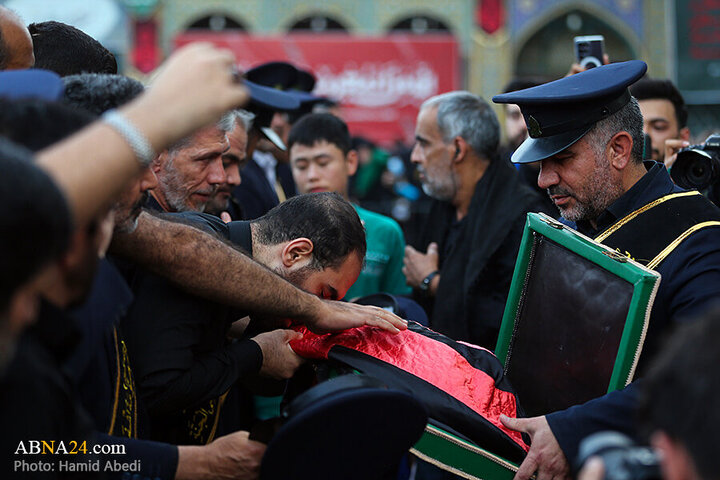 Photos: Changing flag of Hazrat Masoumeh shrine's dome ahead of Muharram