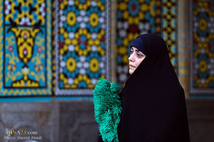Photos: Changing flag of Hazrat Masoumeh shrine's dome ahead of Muharram