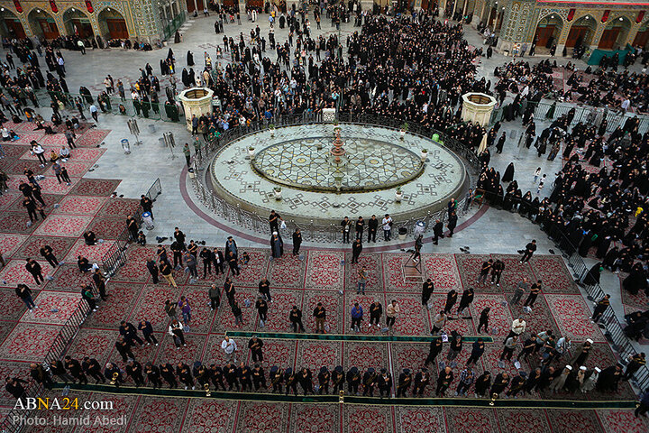 Photos: Changing flag of Hazrat Masoumeh shrine's dome ahead of Muharram