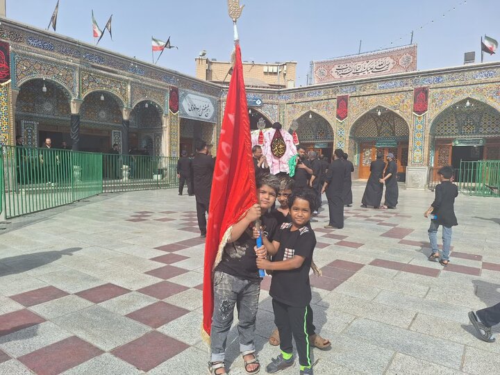 qom