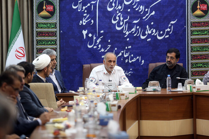 Photos: Donation of holy flag of Hazrat Fatima Masoumeh Shrine to head of Emergency medical services
