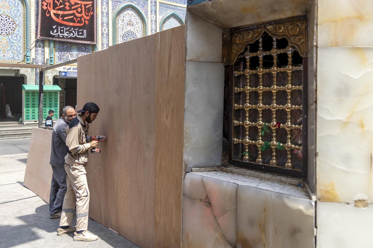 Starting to install wooden barriers to organize flow of visitors during Arbaeen pilgrimage in Karbala