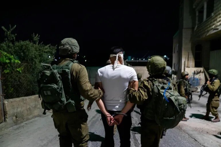Israeli forces storm multiple West Bank towns and detain civilians