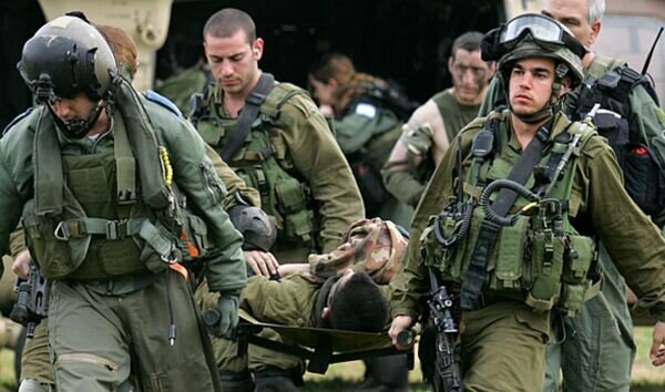 Israeli officer and soldier wounded by sniper fire in northern Gaza