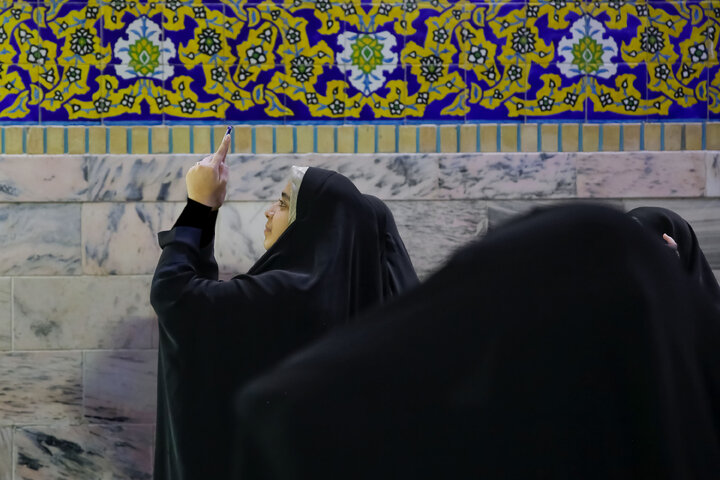 Photos: Beautiful scenes of lunar eclipse above Imam Reza holy shrine