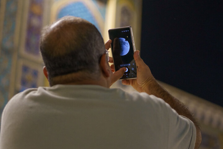 Photos: Beautiful scenes of lunar eclipse above Imam Reza holy shrine