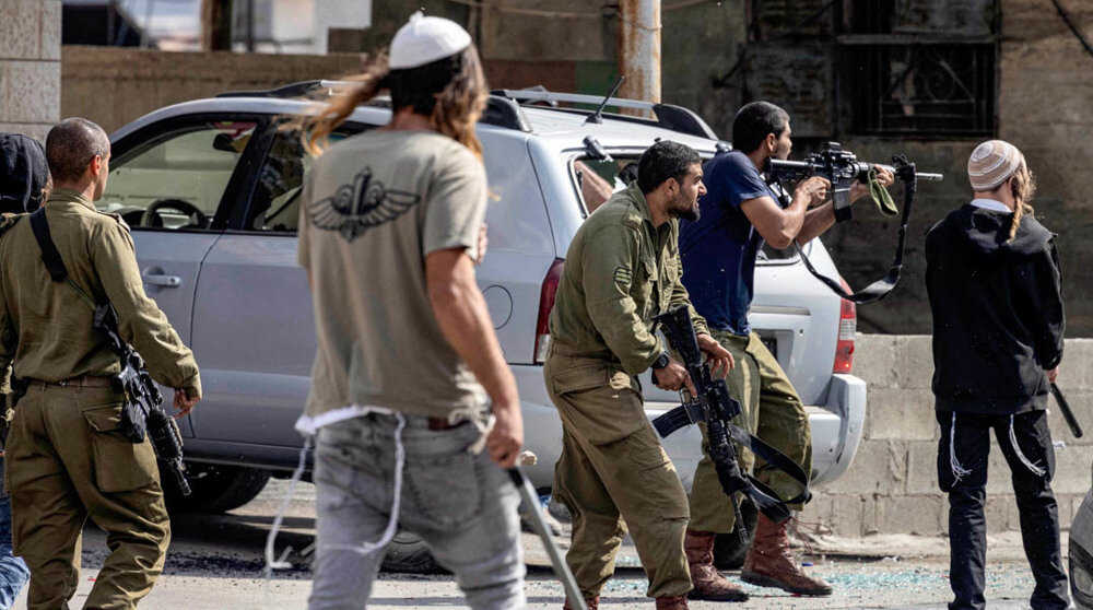 Journalist exposes Jewish settler ambush on Palestinian olive pickers