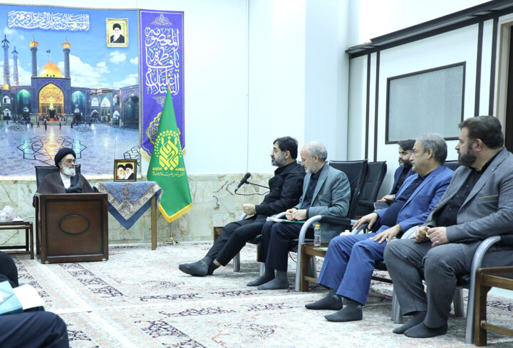 qom