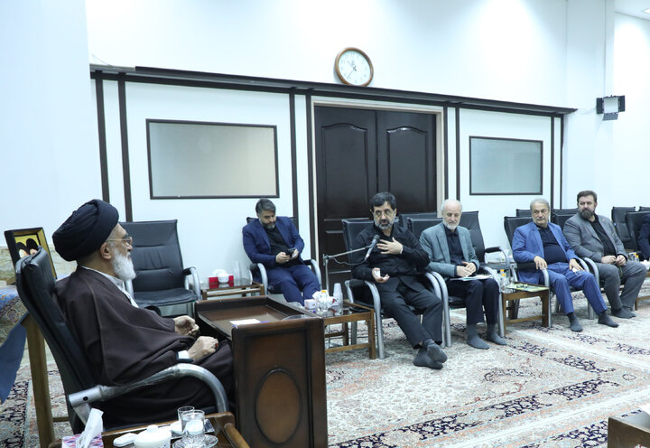 qom