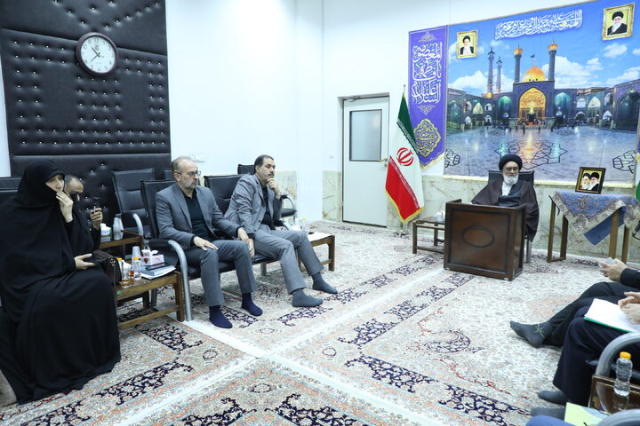 qom
