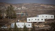 Israeli settlers install mobile homes to expand Migron settlement