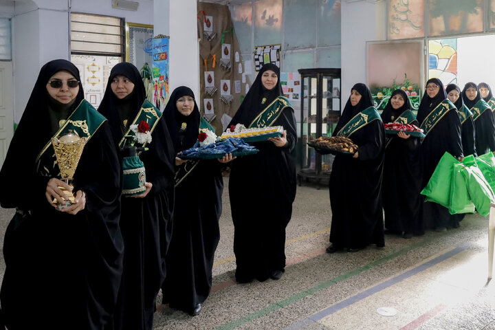 Photos: Distribution of jackets, cultural items by servants of Imam Reza holy shrine