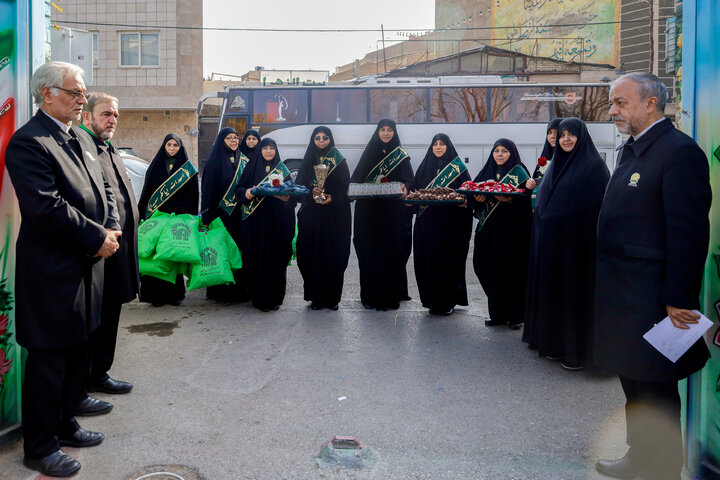 Photos: Distribution of jackets, cultural items by servants of Imam Reza holy shrine