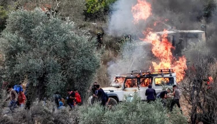 Zionist settlers torch vehicles, spray racist slogans in attack on Atara, north of Ramallah