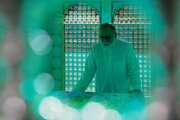 Photos: Dust-cleaning ceremony of Imam Reza holy shrine attended by families of martyrs of recent unrest