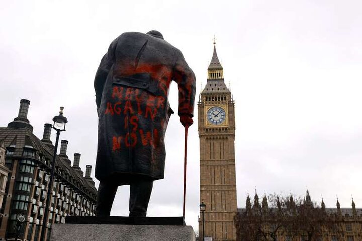 Photos: Writing Anti‑Zionist Slogans on Churchill Statue Outside UK Parliament