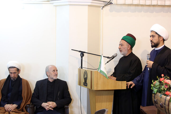 تکریم خانواده شهدای استان قم با حضور خادمان حرم امام حسین(ع)
