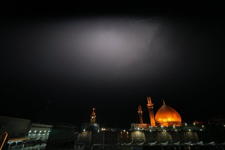Informe fotográfico | El Santuario de Al-Askari (PB) en Samarra brilla entre tormentas y lluvia divina
