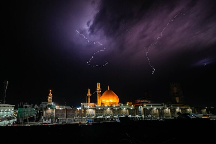 Informe fotográfico | El Santuario de Al-Askari (PB) en Samarra brilla entre tormentas y lluvia divina
