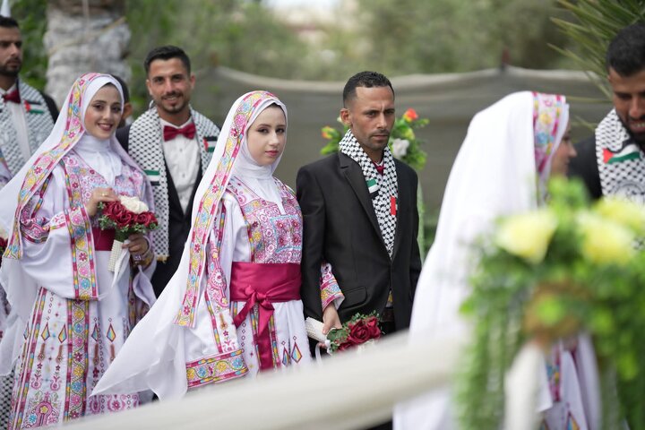 گزارش تصویری | جشن عروسی ۱۵۰ زوج فلسطینی در غزه