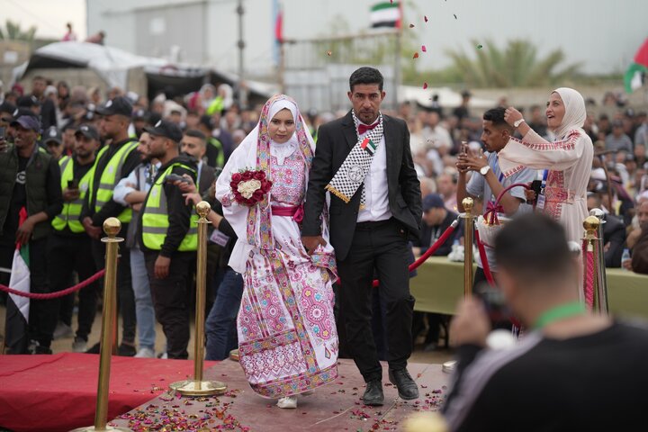 گزارش تصویری | جشن عروسی ۱۵۰ زوج فلسطینی در غزه
