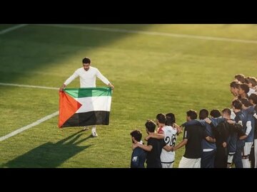 Rayo Vallecano's Ilias Akhomach displays Palestinian flag on pitch during Conference League celebrations