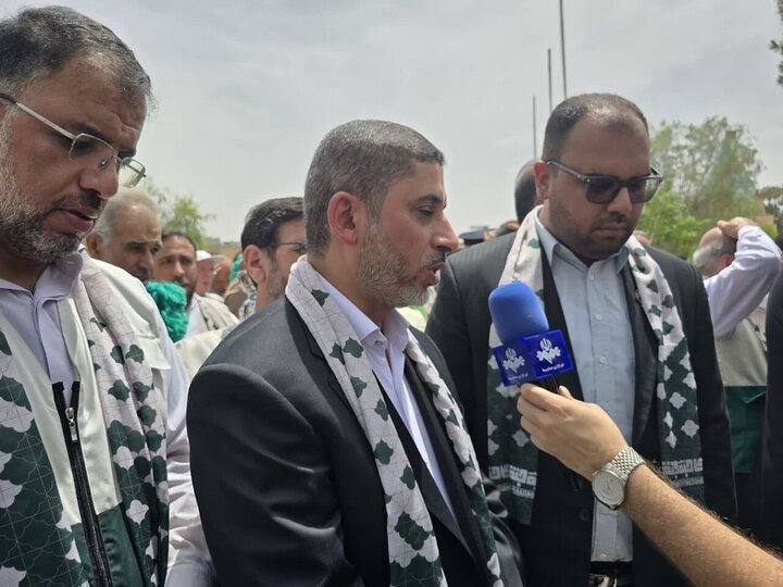 Photos: Holy flag of Imam Ali Shrine raised in Qom