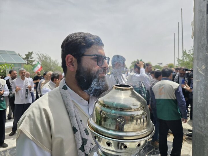 Photos: Holy flag of Imam Ali Shrine raised in Qom